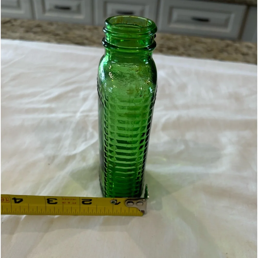 Vintage anchor hocking Emerald‎ Green studied English hobnail bottle.